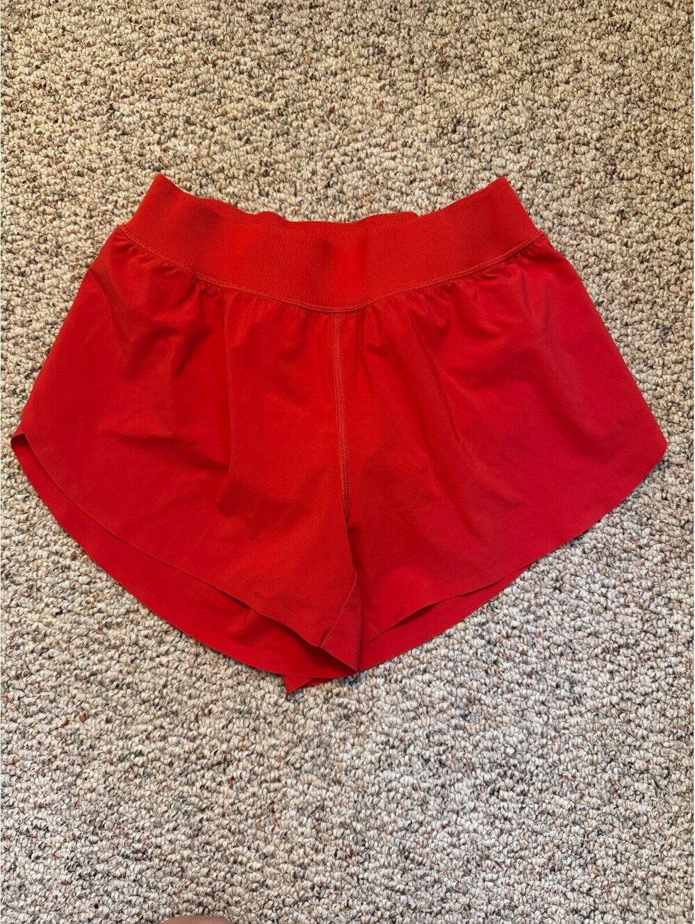 Athletic running shorts bright red